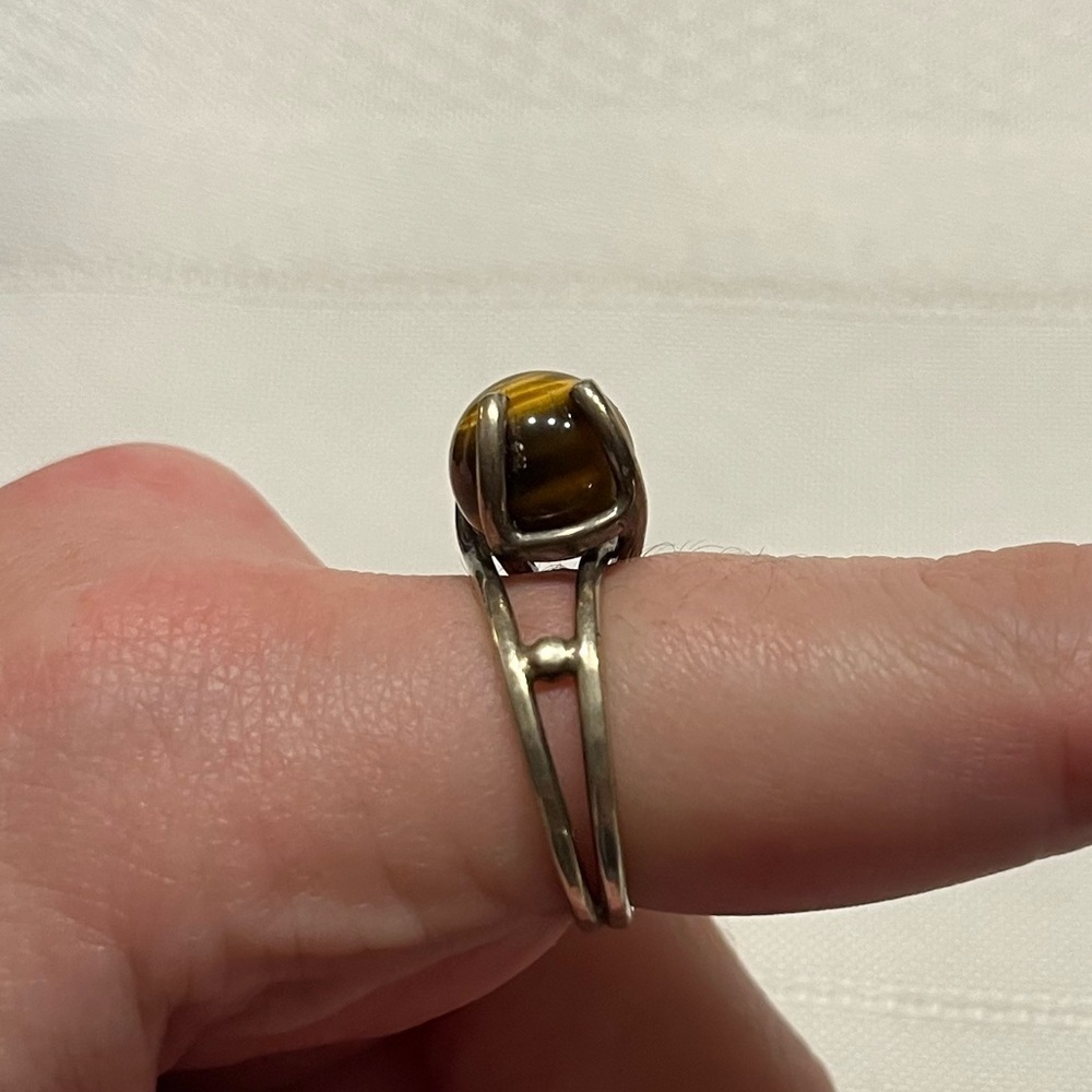 TIGER’s EYE swirl ring, sterling silver STAMPED
size 7 
Unique. Rare.